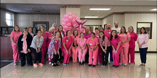 Picture of Mizell Memorial Hospital Staff Group Picture in the Lobby area.