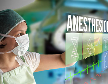 Anesthesiology concept. Doctor using a futuristic touch screen concept computer with medical icons on it. Healthcare operation surgery room on background.